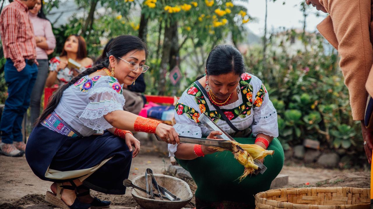 Andean ancestral cooking ceremony with a traditional musician